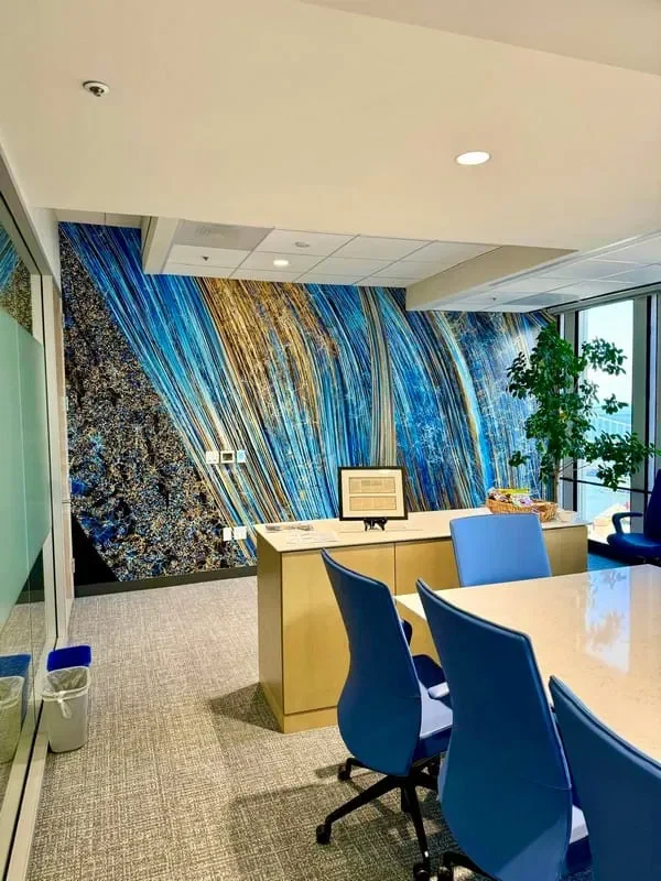 Professional wallpaper installer applying wallcovering
